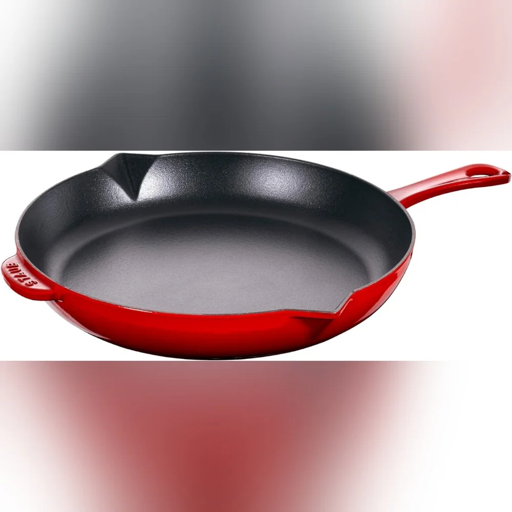 Used once Staub classic cast iron fry pan in cherry red